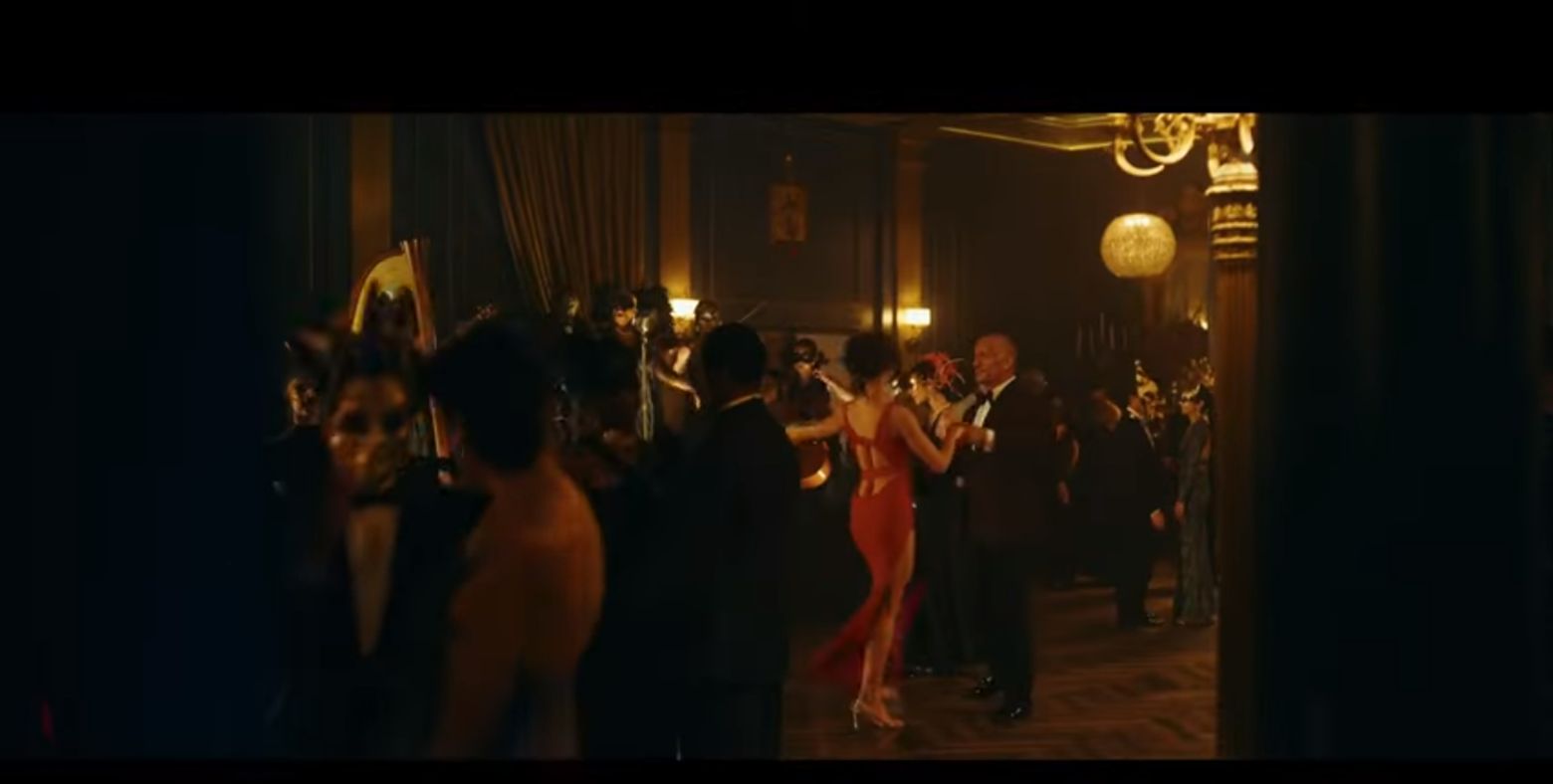 A group of people dancing in a room  Description automatically generated